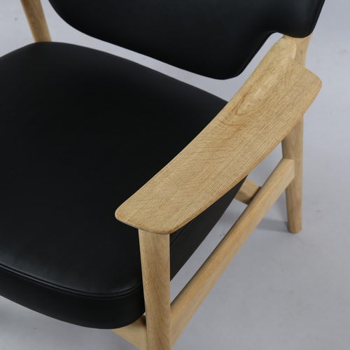 100 - A Scandinavian Veng lounge chair in black leather and soaped oak by TORBJORN BEKKEN designed 1960 fo... 