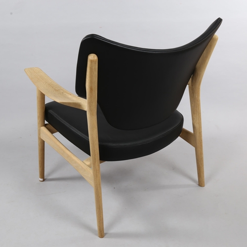 100 - A Scandinavian Veng lounge chair in black leather and soaped oak by TORBJORN BEKKEN designed 1960 fo... 