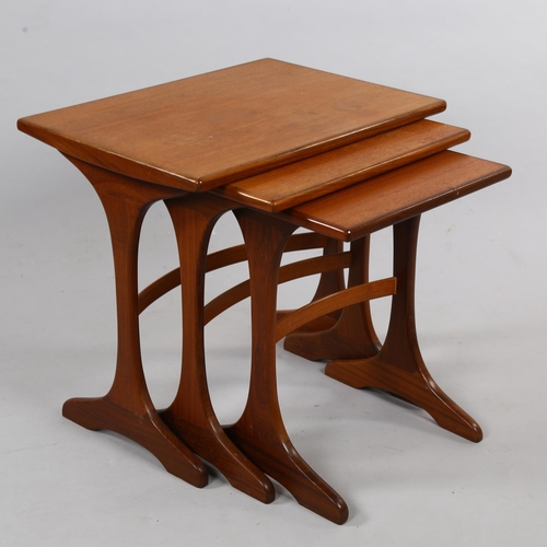 108 - IB KOFOD LARSEN for G Plan, a nest of 3 teak tables, largest width 56cm x Depth 41cm x Height 52cm