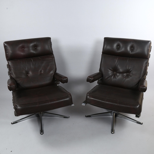 124 - A pair of mid-century chromed steel swivel armchairs, faux leather upholstery, no makers marks, heig... 