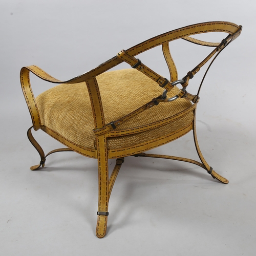 157 - A trompe l’oeil wrought iron lounge chair in the manner of Adnet or Hermes, the iron work frame simu... 