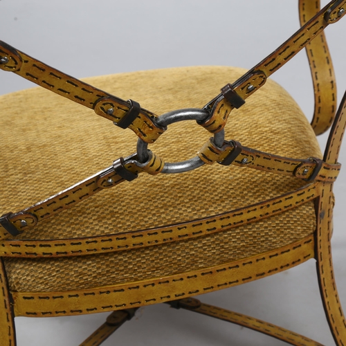 157 - A trompe l’oeil wrought iron lounge chair in the manner of Adnet or Hermes, the iron work frame simu... 
