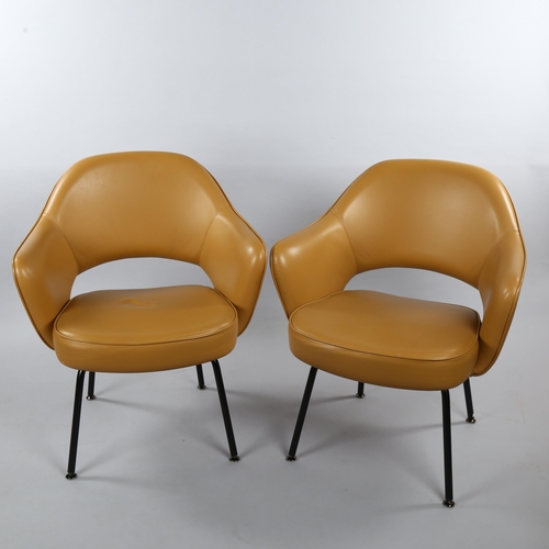 17 - EERO SAARINEN, a pair of Knoll Executive armchairs in tan leather with impressed Knoll Studio to leg... 