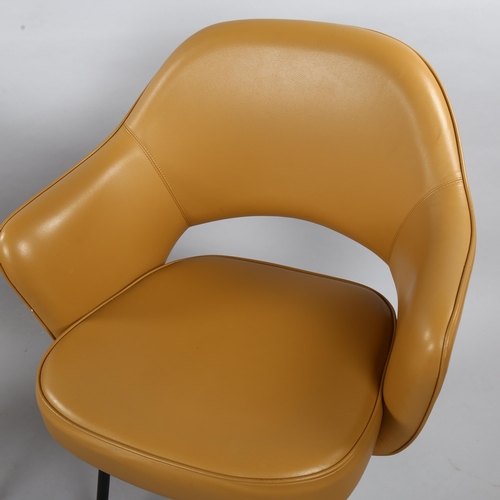 18 - EERO SAARINEN, a pair of Knoll Executive armchairs in tan leather with impressed Knoll Studio to leg... 