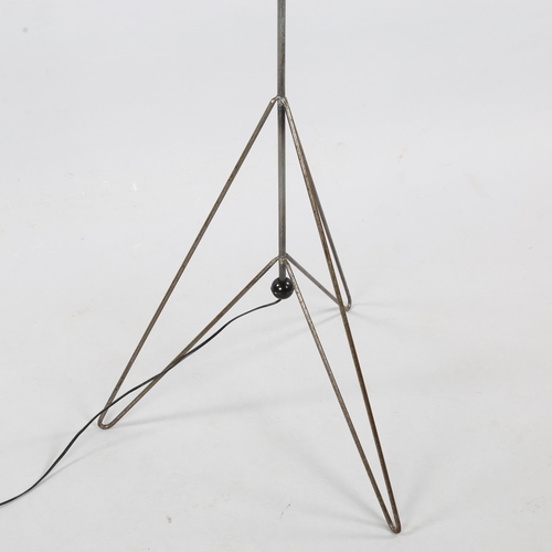 30 - A 1950s' steel standard lamp, in the manner of ERNEST RACE, with Skylon style base, later parchment ... 