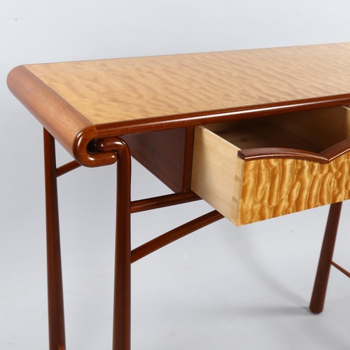 36 - ANDREW VARAH (1944-2012), a craftsman made console table in quilted maple and walnut, circa 1990, wi... 