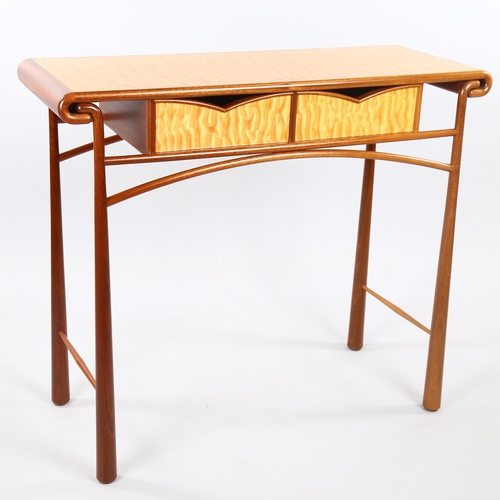 37 - ANDREW VARAH (1944-2012), a craftsman made console table in quilted maple and walnut, circa 1990, wi... 