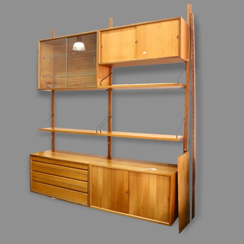 59 - A Danish mid-century teak racking wall system, with 4 rails for 3 section configuration (2 section s... 