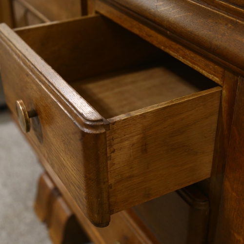 74 - CHARLES DUDOUYT, a 1940s' oak sideboard, 3 central drawers and 2 shelved cupboards, 190 x 50cm, heig... 