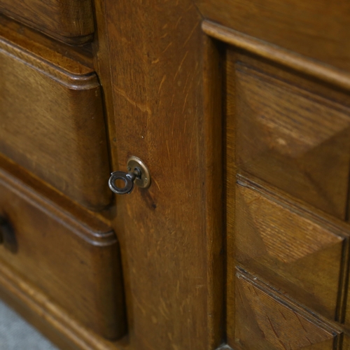 74 - CHARLES DUDOUYT, a 1940s' oak sideboard, 3 central drawers and 2 shelved cupboards, 190 x 50cm, heig... 