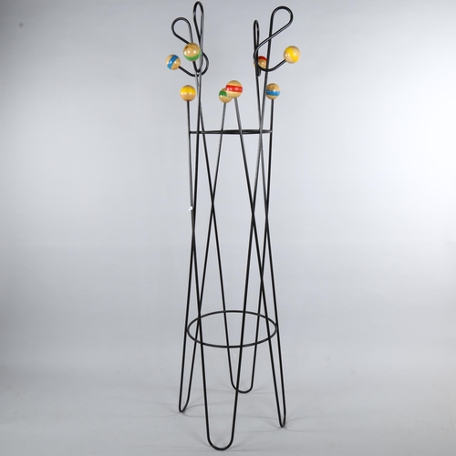 96 - ROGER FERAUD, (1890-1964), a Cle De Sol coat stand, steel frame with wood ball ends, height 178cm