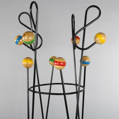 96 - ROGER FERAUD, (1890-1964), a Cle De Sol coat stand, steel frame with wood ball ends, height 178cm