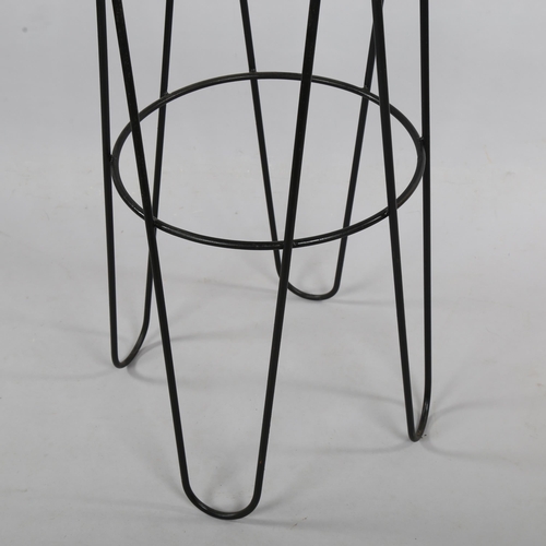 96 - ROGER FERAUD, (1890-1964), a Cle De Sol coat stand, steel frame with wood ball ends, height 178cm