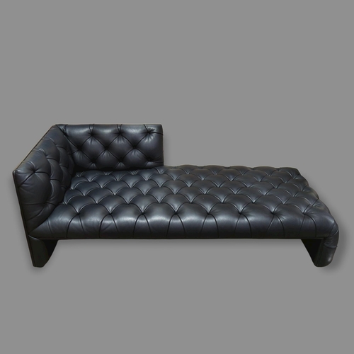 99 - A Wittmann Edwards chaise longue or daybed, in buttoned black leather designed by EDWARD B TUTTLE, A... 