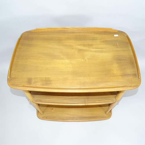 2002 - A mid-century Ercol elm 3-tier trolley, 72cm x 77cm x 46cm