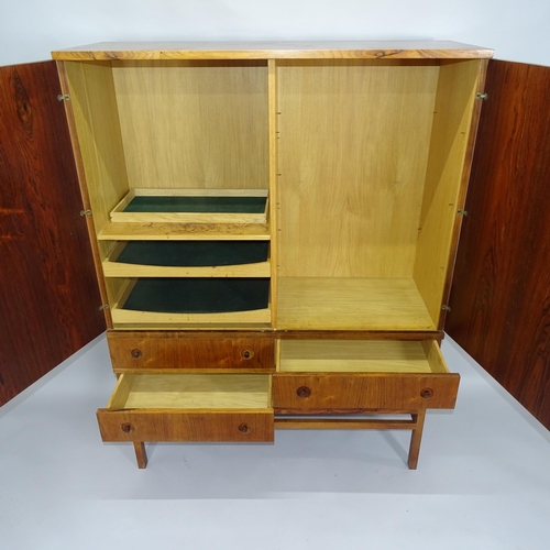 2015 - A Mid-century Danish rosewood drinks cabinet, the oask lined interior fitted with drawers and glass ... 