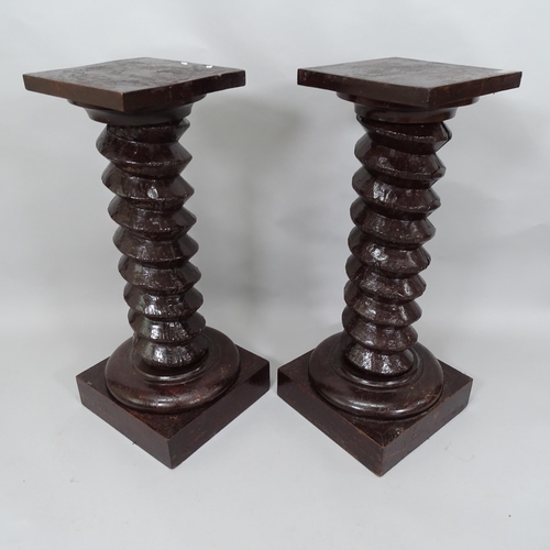 2020 - A pair of French stained elm spiral turned columns, Height 86cm