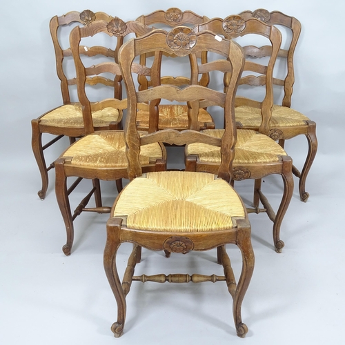 2023 - A set of 6 French rush seated ladder back dining chairs