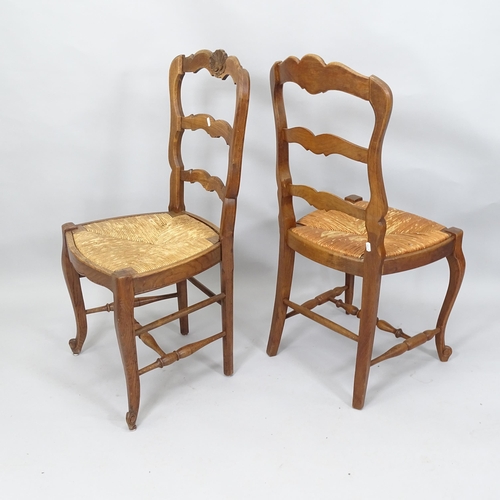 2023 - A set of 6 French rush seated ladder back dining chairs