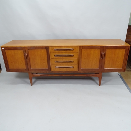 2030 - A Mid-century teak G Plan Fresco Long John sideboard by Victor Wilkins, with four fitted drawers and... 