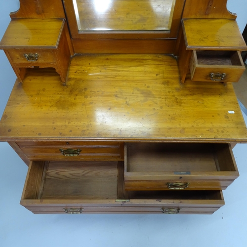 2033 - An Edwardian satinwood dressing chest with raised mirrored back, two short and two long drawers, rai... 