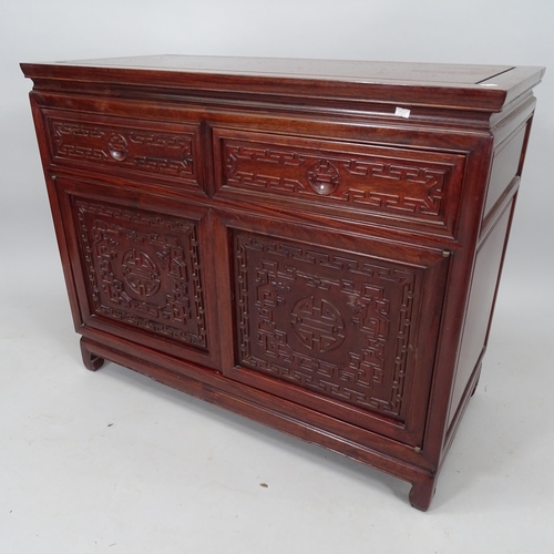 2044 - An Oriental hardwood side cabinet, with 2 frieze drawers and cupboards under, 103cm x 83cm x 49cm