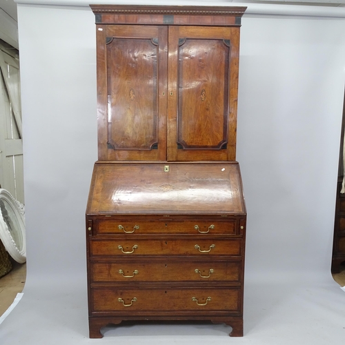 2045 - A 18th century oak 3-section bureau bookcase, the fall-front revealing a fitted interior with 4 long... 