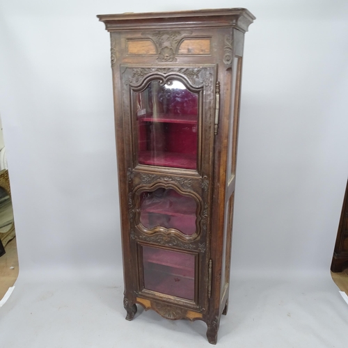 2052 - A French oak single door display cabinet, with glazed panelled sides and carved decoration, 80 x 200... 