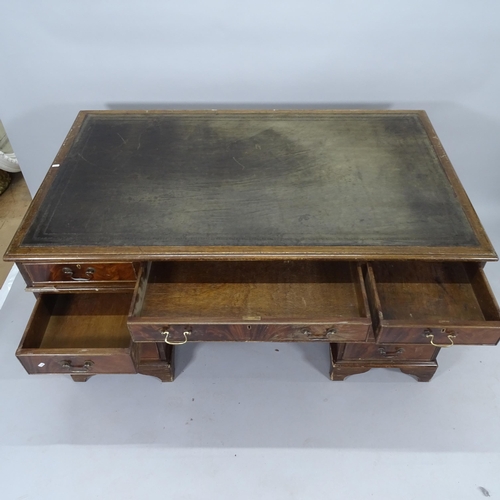 2054 - An Edwardian mahogany twin-pedestal writing desk, with inset tooled leather skiver and 9 fitted draw... 