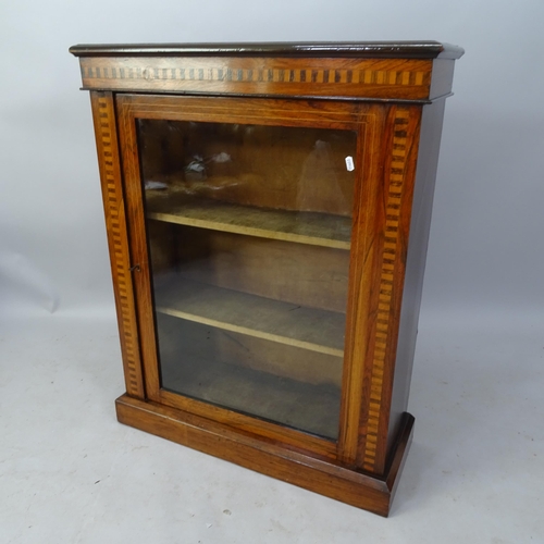 2057 - A 1930s oak and satinwood-strung pier cabinet, with single glazed door and inlaid decoration, 76cm x... 