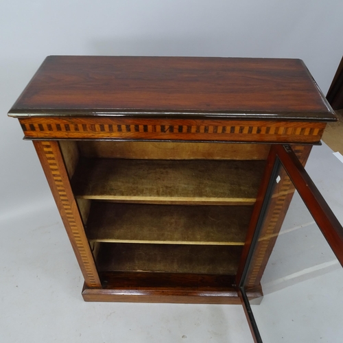 2057 - A 1930s oak and satinwood-strung pier cabinet, with single glazed door and inlaid decoration, 76cm x... 