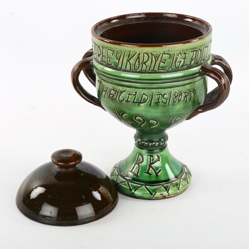 204 - A Dicker Ware green/brown glaze pottery bowl and cover, with 4 handles and incised inscription, heig... 