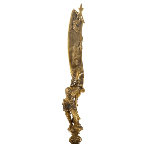 206 - **DESCRIPTION CHANGE** A 19th century *French gilt-bronze* paper knife in the form of a knight holdi... 