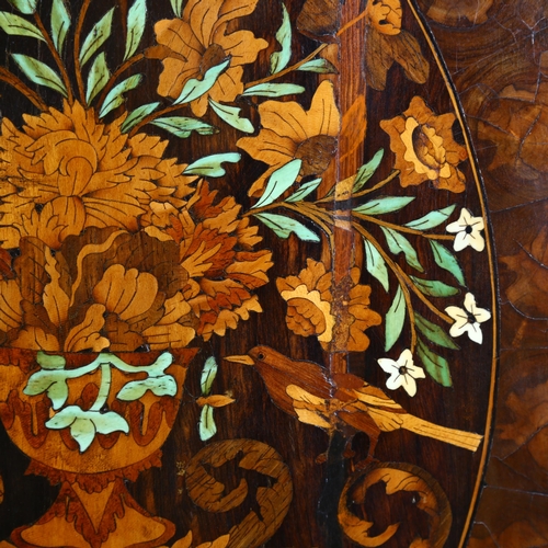 216 - An exceptional William and Mary oyster laburnum and marquetry inlaid cabinet on stand, covered in sp... 