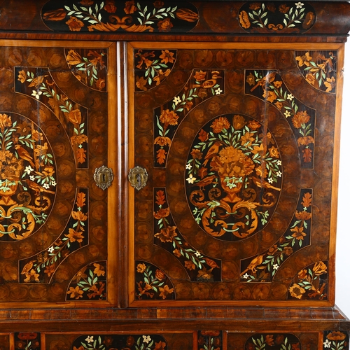 216 - An exceptional William and Mary oyster laburnum and marquetry inlaid cabinet on stand, covered in sp... 