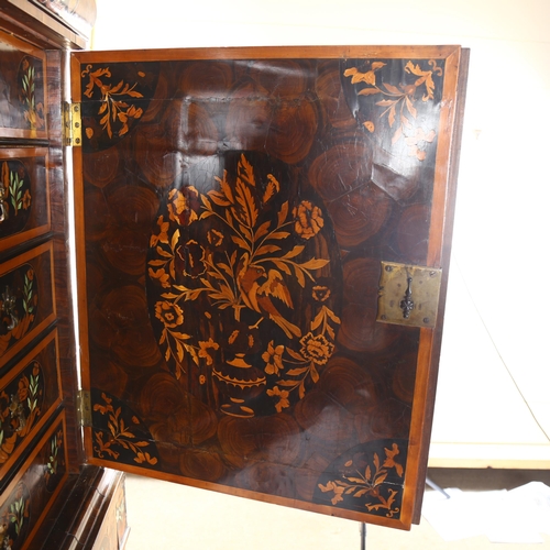 216 - An exceptional William and Mary oyster laburnum and marquetry inlaid cabinet on stand, covered in sp... 