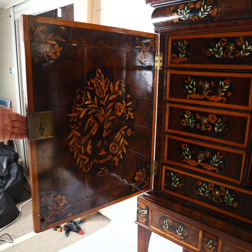 216 - An exceptional William and Mary oyster laburnum and marquetry inlaid cabinet on stand, covered in sp... 