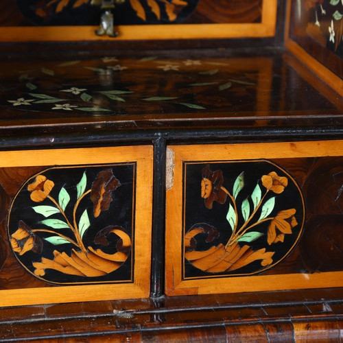 216 - An exceptional William and Mary oyster laburnum and marquetry inlaid cabinet on stand, covered in sp... 