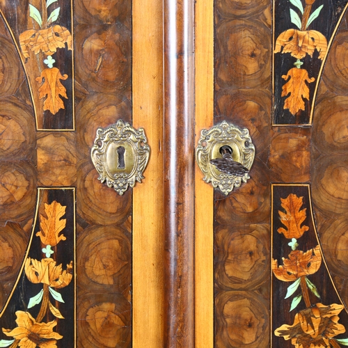 216 - An exceptional William and Mary oyster laburnum and marquetry inlaid cabinet on stand, covered in sp... 