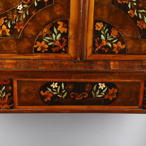 216 - An exceptional William and Mary oyster laburnum and marquetry inlaid cabinet on stand, covered in sp... 