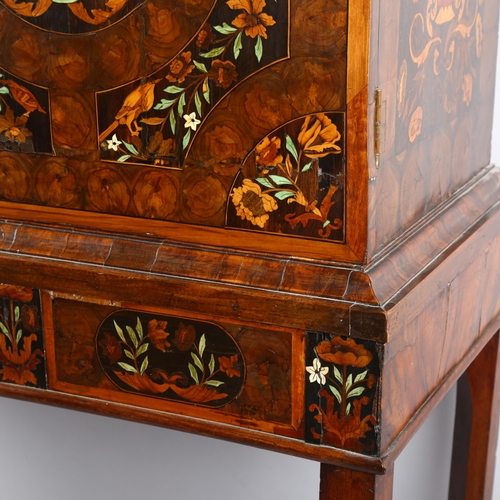 216 - An exceptional William and Mary oyster laburnum and marquetry inlaid cabinet on stand, covered in sp... 