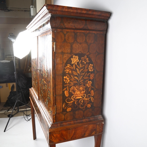 216 - An exceptional William and Mary oyster laburnum and marquetry inlaid cabinet on stand, covered in sp... 