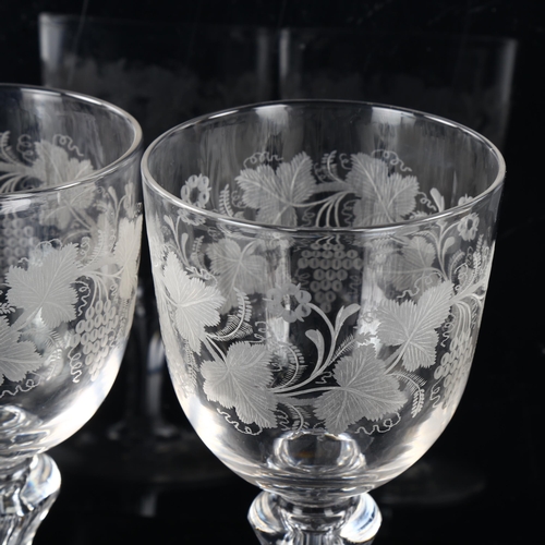 225 - A pair of 19th century wine glasses with etched grapevine designs, height 18cm