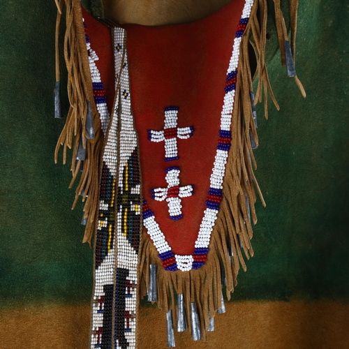 238 - Native American hide jacket and beaded necklace, animal motif designs, mid-20th century