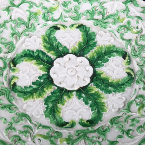 243 - A Meissen porcelain cabinet plate, with relief moulded fern decoration, diameter 27cm