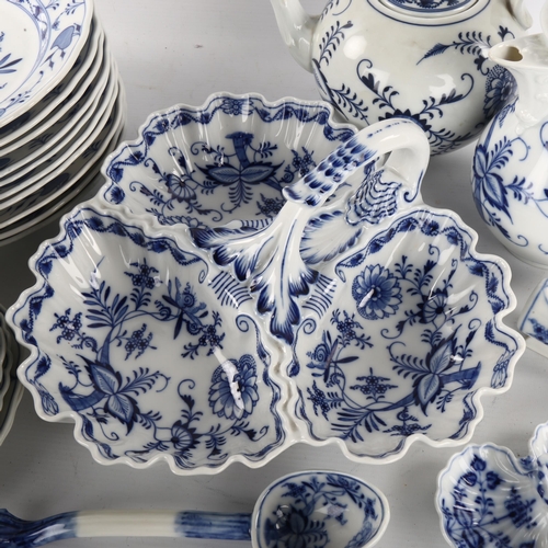 246 - A quantity of Meissen blue and white porcelain tableware, including a 3-section table centre dish wi... 