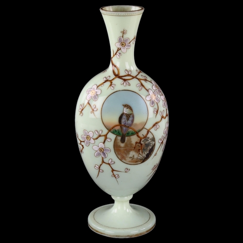 250 - A Victorian opaque pale green glass vase, with painted bird decoration in Japanese style, height 33c... 