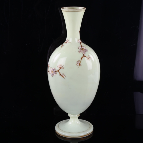 250 - A Victorian opaque pale green glass vase, with painted bird decoration in Japanese style, height 33c... 