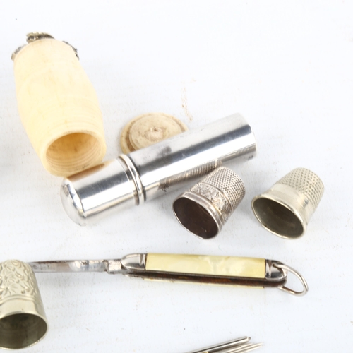 270 - A collection 5 thimbles (2 silver), bone barrel-shaped needle case and another silver needle case