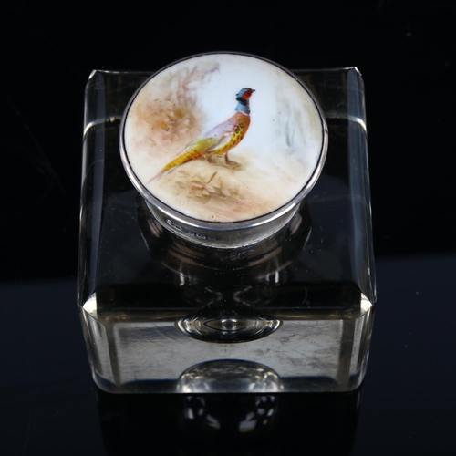 273 - A silver-mounted glass inkwell, with inset painted porcelain top depicting a pheasant, hallmarks Bir... 